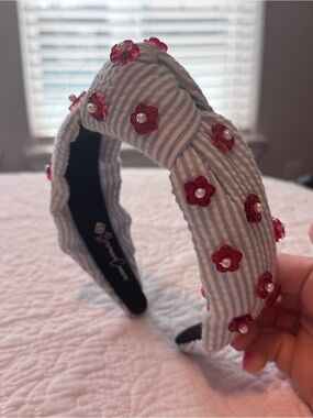 Brianna Cannon Striped Blue Headband with Red Flower Embellishments